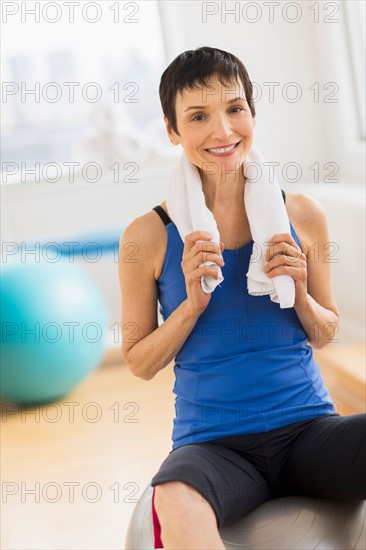 Portrait of mature woman in gym.