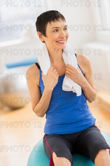 Portrait of mature woman in gym.