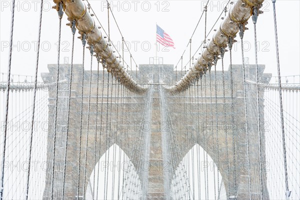 Brooklyn Bridge in winter. USA, New York State, New York.