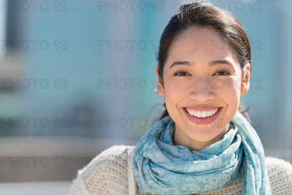 Portrait of smiling young woman.