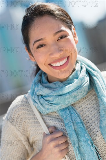 Portrait of smiling young woman.