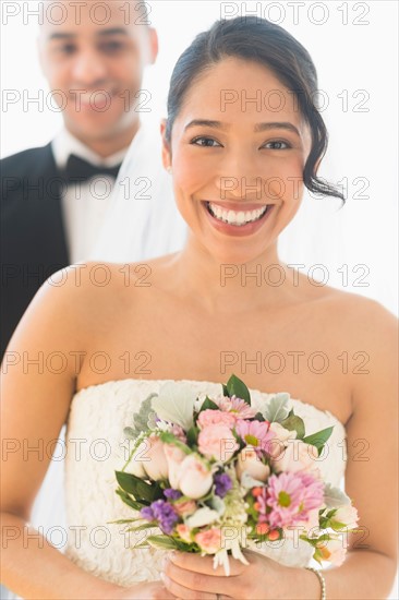 Portrait of happy newlywed couple.