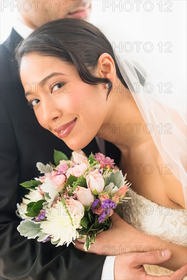 Portrait of happy newlywed couple.