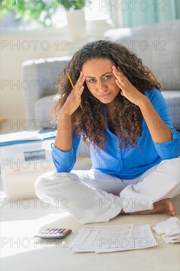 Young woman dealing with home finance.