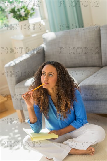 Young woman dealing with home finance.