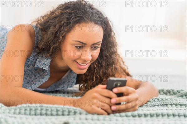 Young woman using smartphone.