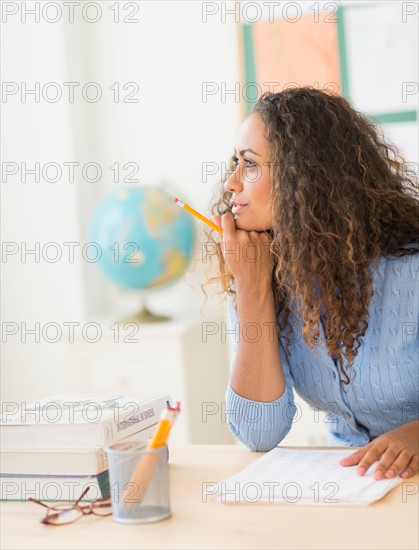 Portrait of elementary school teacher in class.