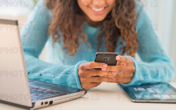 Young woman in home office.