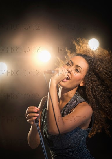 Stage performance of young singer.