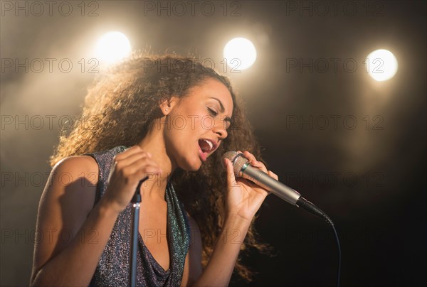 Stage performance of young singer.