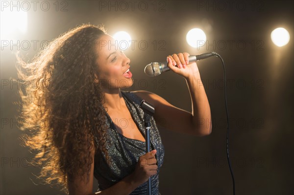 Stage performance of young singer.