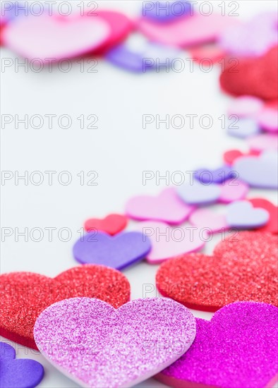 Studio Shot of foam hearts on white background