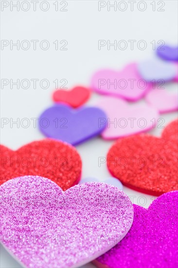 Studio Shot of foam hearts on white background