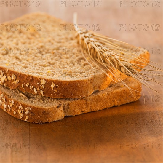 Studio Shot of slices of bread with wheat
