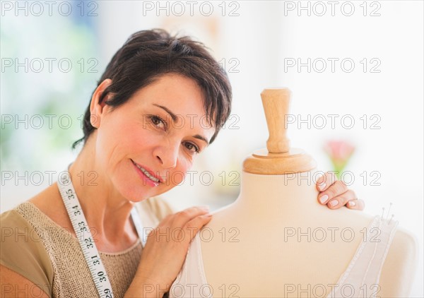 Portrait of mature woman with clothing bust