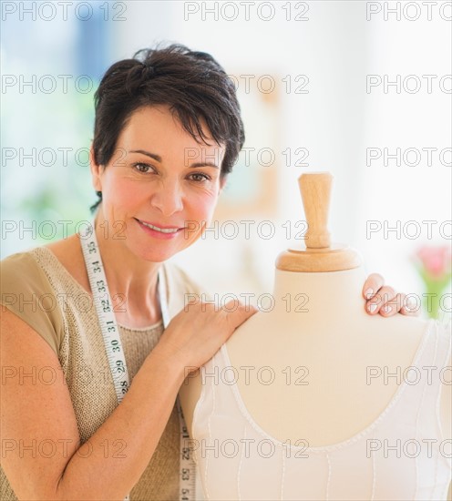 Portrait of mature woman with clothing bust