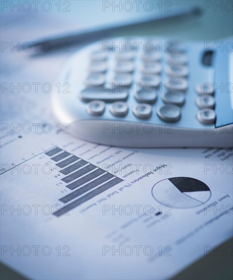 Studio Shot of calculator and paper material