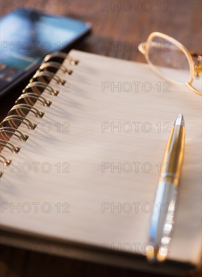 Studio Shot spiral-bound notebook and pen