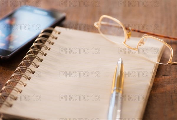 Studio Shot spiral-bound notebook and pen