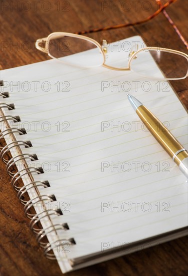 Studio Shot spiral-bound notebook and pen