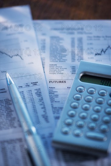 Studio Shot of calculator, pen and documents