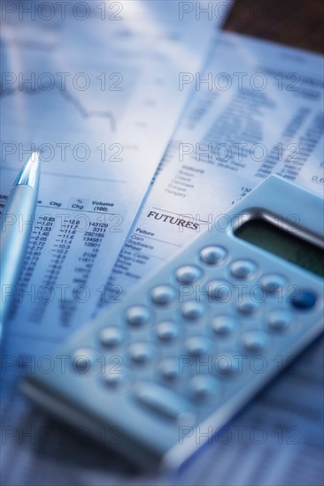 Studio Shot of calculator, pen and documents