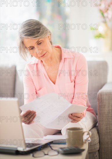 Portrait of woman working at home