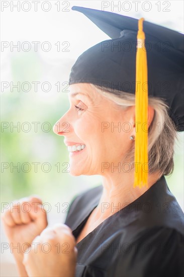 Portrait of woman in graduation cap