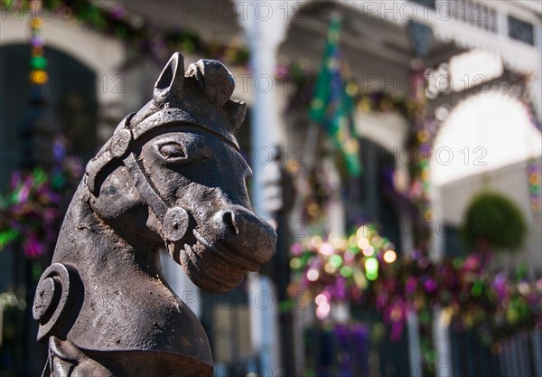 Horse statue in front of old building