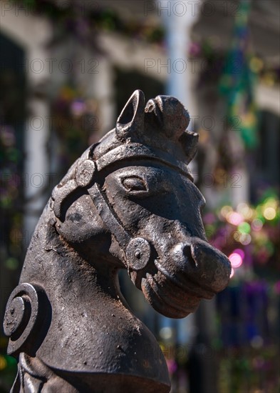 Horse statue in front of old building