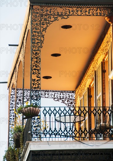 Ornate balcony with potted plants