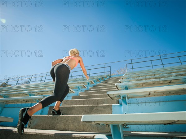 Woman walking up steps