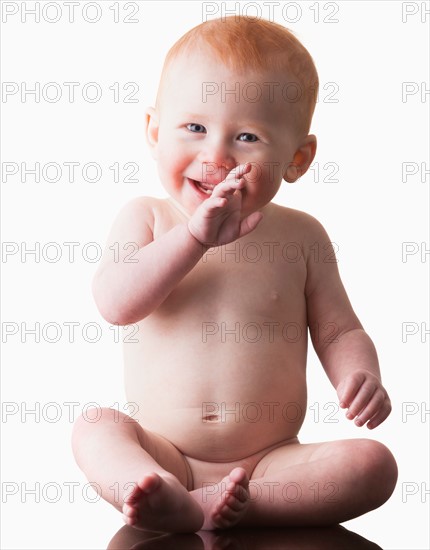 Studio shot of naked baby boy (18-23 months)