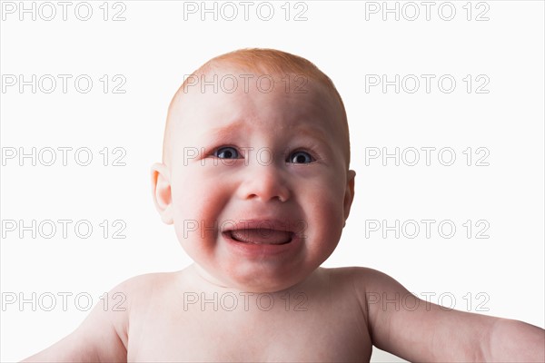 Studio shot portrait of crying baby boy (18-23 months)