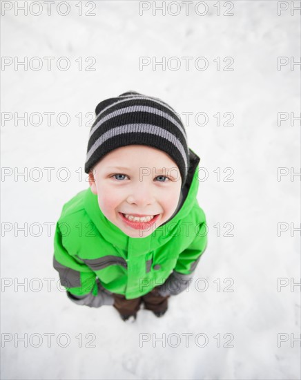 Directly above portrait of standing boy (4-5) looking up