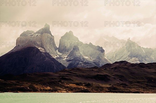 Scenic view of mountain range at sunrise