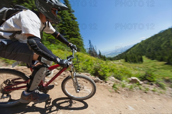 Man mountain biking