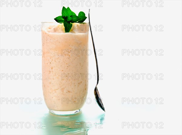 Fruit smoothie in tall glass