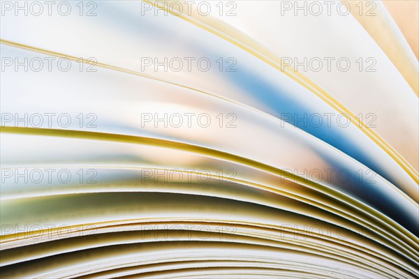 Book pages in motion.