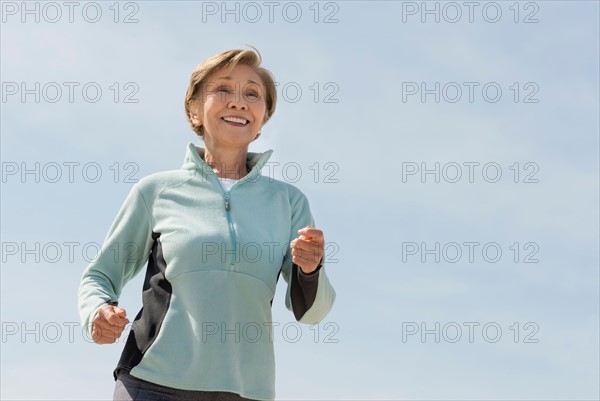 Senior woman jogging.