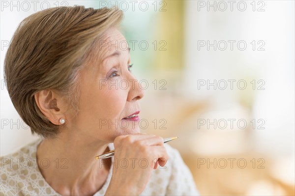 Senior woman thinking.