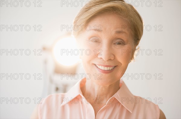 Portrait of senior woman smiling.