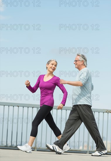 Senior couple walking together.