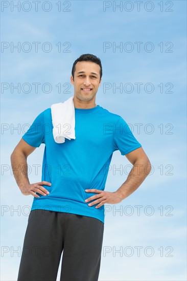 Young man resting after running.