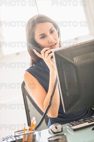 Young woman doing home finances.