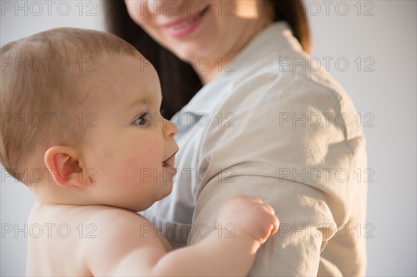 Mother with baby daughter (6-11 months)