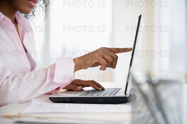 Woman working on laptop