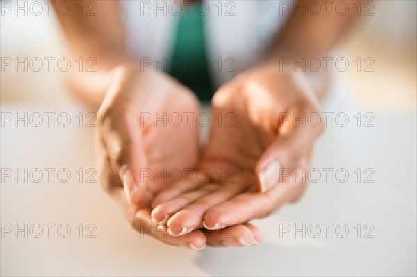 Woman's hands cupped