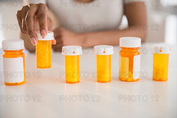 Woman's hand holding medicine