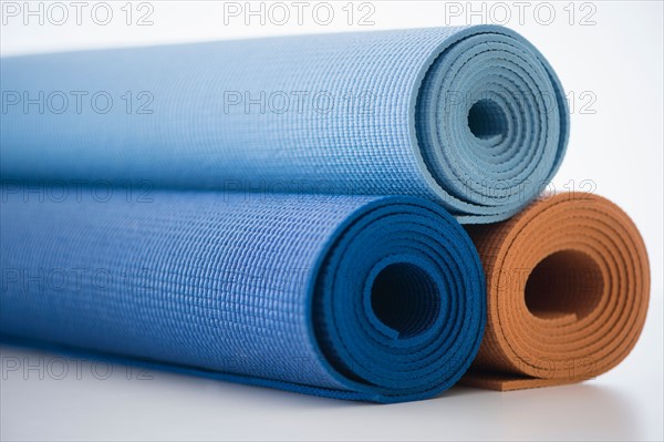Studio Shot of rolled up exercise mats